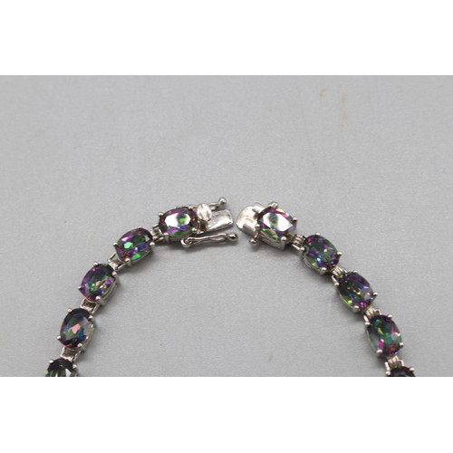 29 - Lot of three contemporary bracelets comprised of 1 round brilliant cut white topaz hallmarked sterli... 