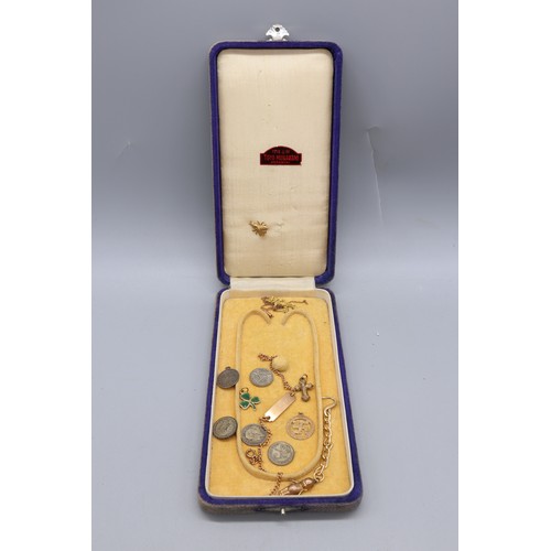34 - Mixed precious metal lot comprising a stamped 14k ID bracelet engraved “Sylvia” with a curb link cha... 
