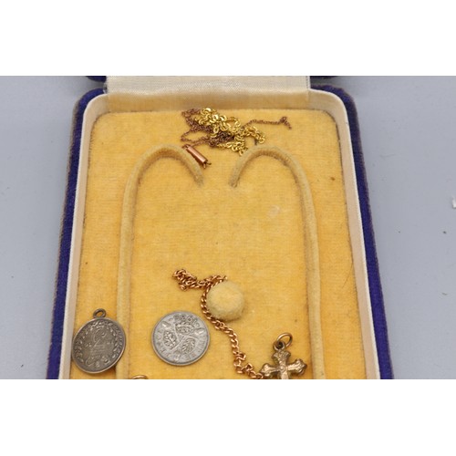 34 - Mixed precious metal lot comprising a stamped 14k ID bracelet engraved “Sylvia” with a curb link cha... 
