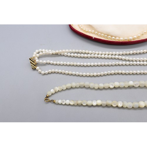 35 - Lot of pearl necklets comprising one individually strung graduating pearl necklet with graduating be... 