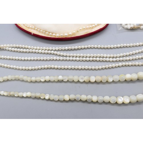 35 - Lot of pearl necklets comprising one individually strung graduating pearl necklet with graduating be... 