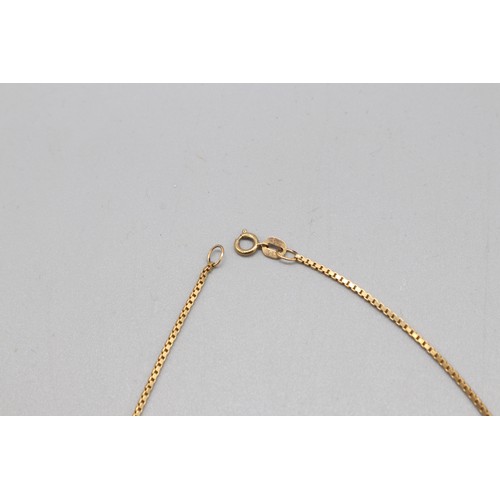 37 - 9ct yellow gold hallmarked 10g ingot pendant on a 9ct stamped yellow gold box chain, total weight 14... 