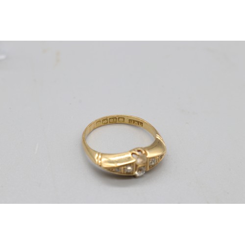 39 - Six stone hallmarked 18ct yellow gold diamond ring comprised of 2x round brilliant cut stones in the... 