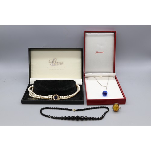 40 - Mixed crystal jewellery comprising a sterling silver blue crystal Baccarat lariat pendant with chain... 