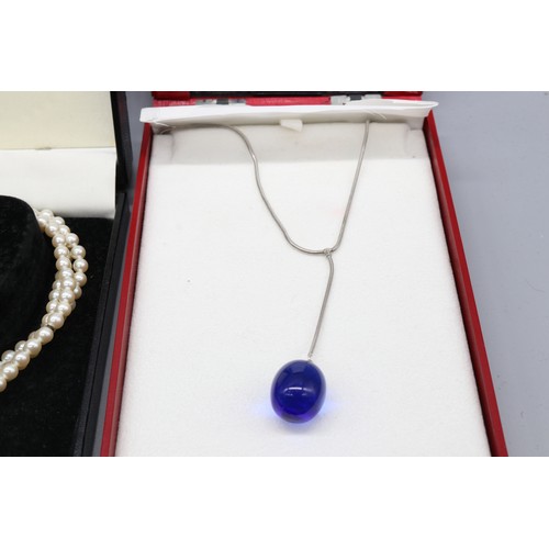 40 - Mixed crystal jewellery comprising a sterling silver blue crystal Baccarat lariat pendant with chain... 