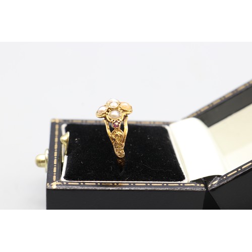 43 - Georgian yellow metal ring (hallmarks worn with age) set with seed pearls and rubies, featuring an i... 