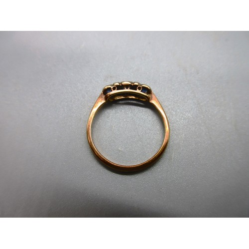 48 - 18ct yellow gold sapphire and diamond bezel-set trilogy ring, comprising three pale blue sapphire st... 