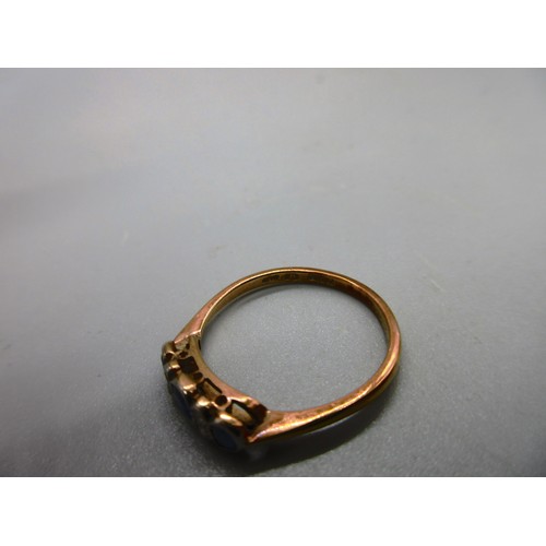 48 - 18ct yellow gold sapphire and diamond bezel-set trilogy ring, comprising three pale blue sapphire st... 