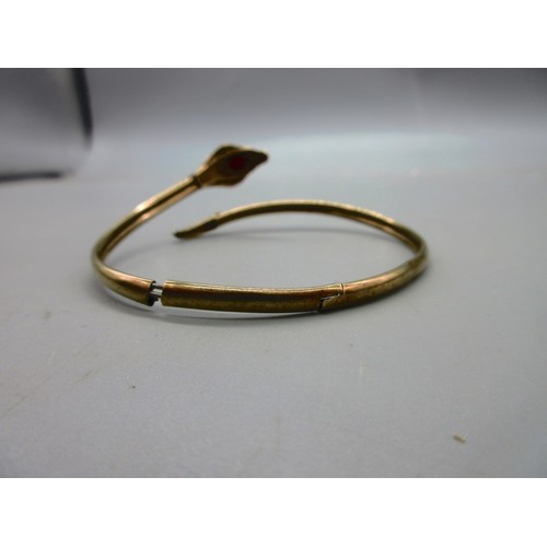 49 - Hallmarked 9ct rose gold engraved hinged bangle with safety chain, weight 6.19g; and a 9ct yellow go... 