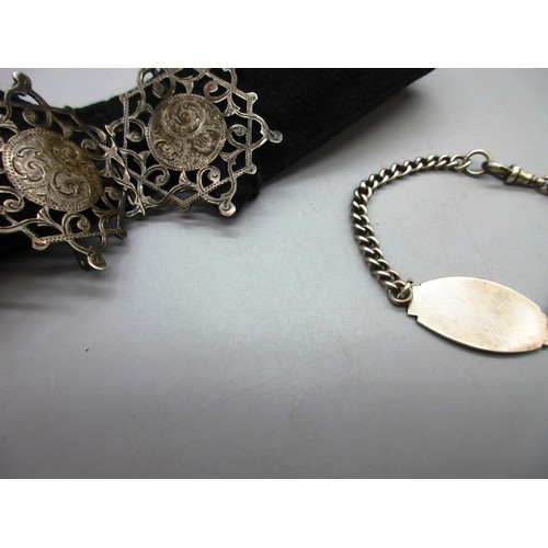 50 - One silver and fabric nurses’ belt with hallmarks on the reverse and hand-engraved scrollwork on a h... 