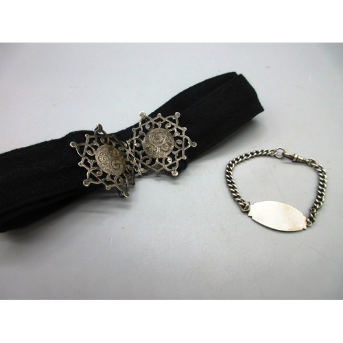 50 - One silver and fabric nurses’ belt with hallmarks on the reverse and hand-engraved scrollwork on a h... 
