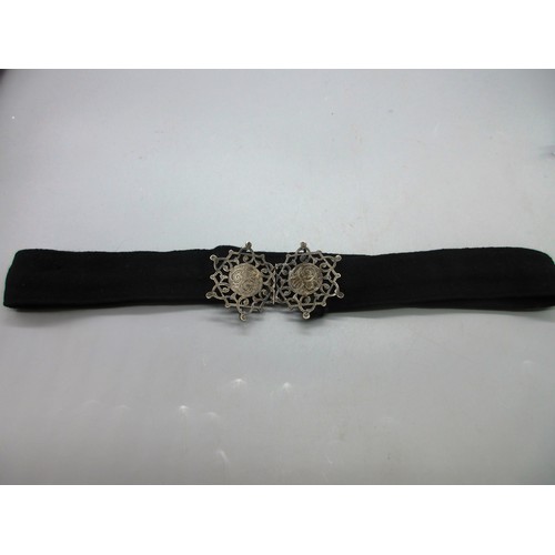 50 - One silver and fabric nurses’ belt with hallmarks on the reverse and hand-engraved scrollwork on a h... 