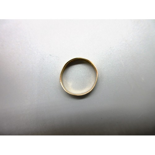 17 - Two 18ct yellow gold hallmarked rings comprising one twisted shank trilogy ring set with three round... 