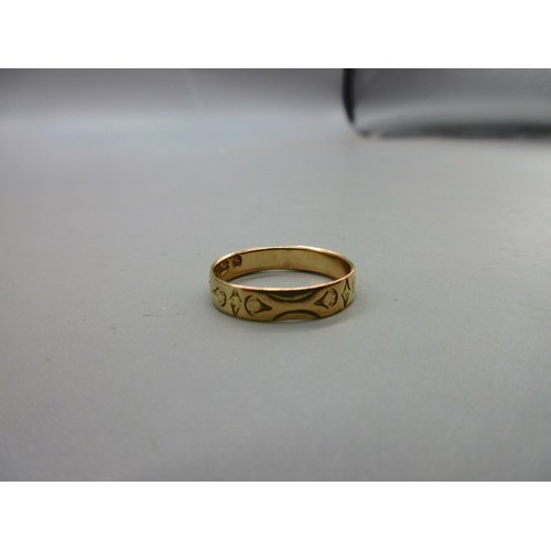 17 - Two 18ct yellow gold hallmarked rings comprising one twisted shank trilogy ring set with three round... 