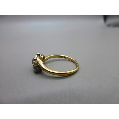17 - Two 18ct yellow gold hallmarked rings comprising one twisted shank trilogy ring set with three round... 