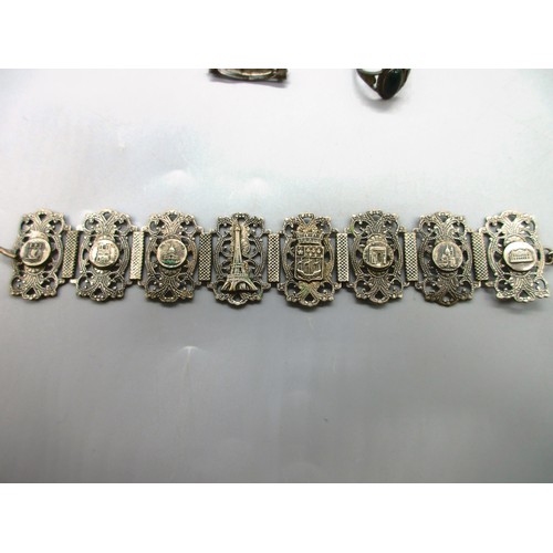 55 - White metal mixed jewellery comprising a decorative French silver “Paris” bracelet with landmark sce... 