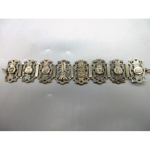 55 - White metal mixed jewellery comprising a decorative French silver “Paris” bracelet with landmark sce... 
