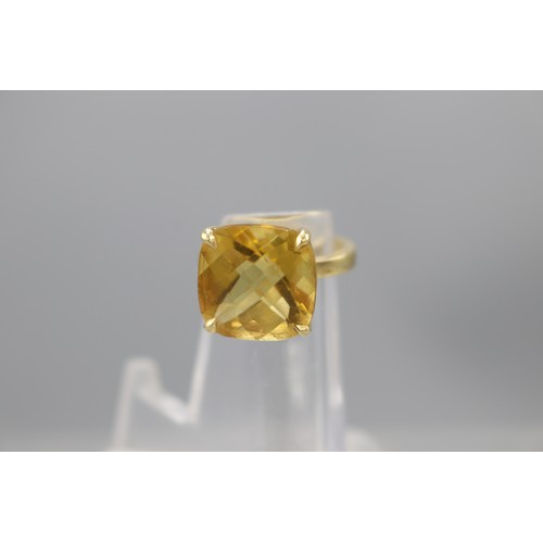 The Helen Flanaghan Collection: Hallmarked 18ct yellow gold Tiffany and Co Cocktail Ring Size M. Single Large Cushion cut Citrine stone 4 claw set stone measures total weight 7.44g. Stone appears free of any visual inclusions or blemishes and 2 1977 Silver Jubilee crowns
Bradley's Shipping £23.00 plus vat (UK Only)