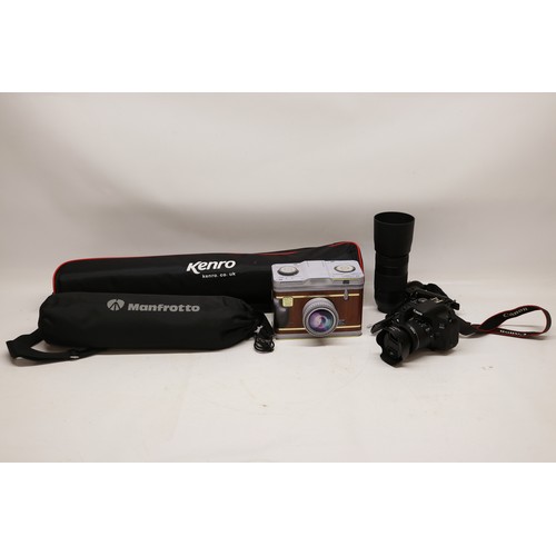 707 - Canon EOS 800D digital camera (lacking battery) with EW-63C lens, Canon ET-74B lens,  Manfrotto trip... 