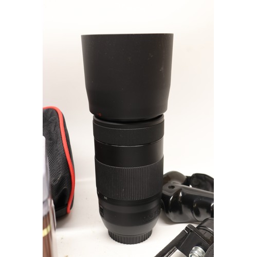 707 - Canon EOS 800D digital camera (lacking battery) with EW-63C lens, Canon ET-74B lens,  Manfrotto trip... 