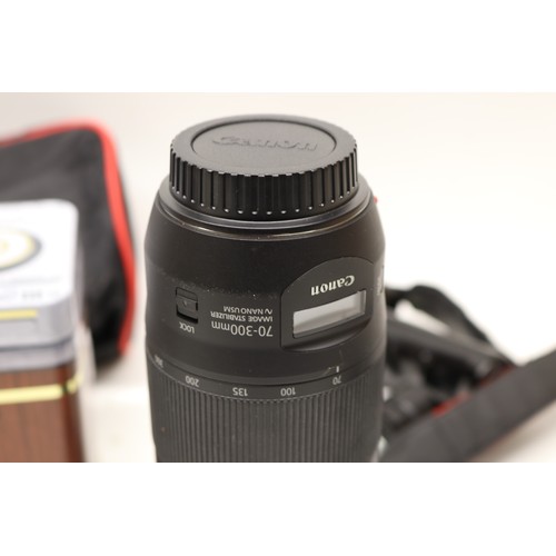 707 - Canon EOS 800D digital camera (lacking battery) with EW-63C lens, Canon ET-74B lens,  Manfrotto trip... 