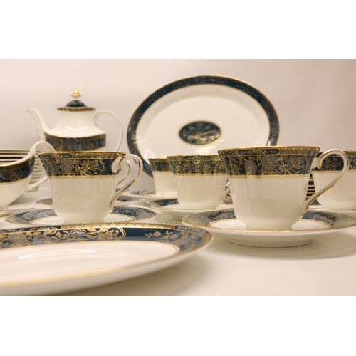 406 - Royal Doulton Carlyle dinner, tea and coffee ware; incl. 14x dinner plates, 12x side plates, 12x des... 