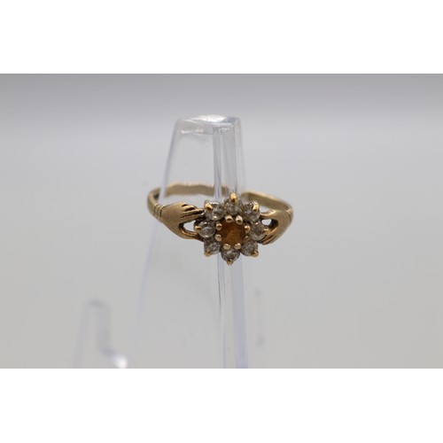 29 - Lot of four hallmarked 9ct yellow gold rings, comprising a CZ solitaire ring with scrollwork shoulde... 