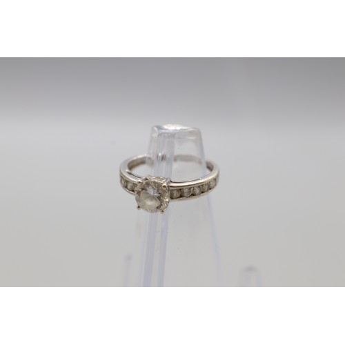 28 - Lot of two stamped 9ct white gold cubic zirconia rings, comprising a hallmarked 9ct white gold princ... 