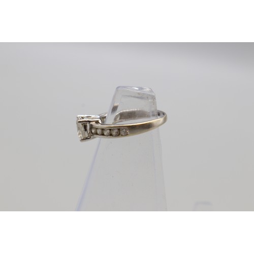 28 - Lot of two stamped 9ct white gold cubic zirconia rings, comprising a hallmarked 9ct white gold princ... 