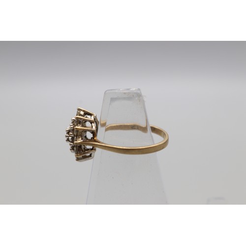 27 - Three hallmarked 9ct yellow gold cubic zirconia cluster rings, comprising a hexagonal flower cluster... 