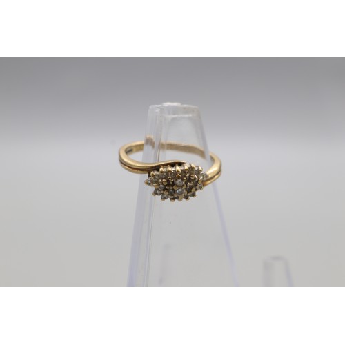 25 - Two yellow gold diamond rings, comprising a hallmarked 9ct yellow gold diamond cluster ring with twi... 