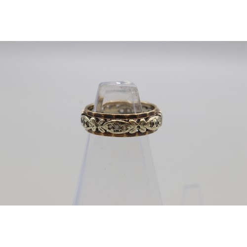 23 - Two stone-set full band rings, comprising a stamped 9ct sapphire and diamond full eternity ring with... 