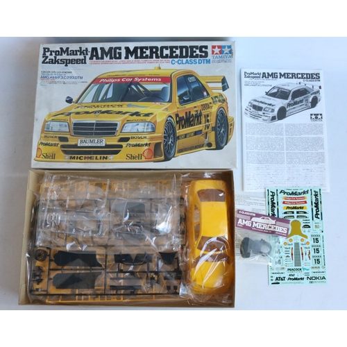 Four 1/24 scale plastic racing car model kits from Tamiya to include a ...