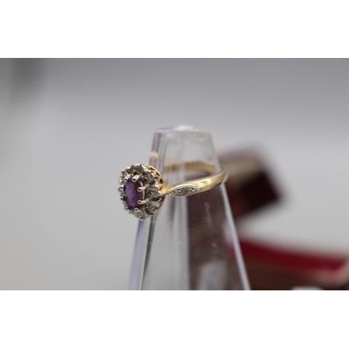 9 - Hallmarked 9ct yellow gold Amethyst faceted oval halo set ring with diamond-set shoulders, size L, w... 