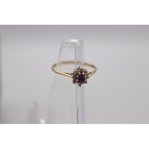 48 - Lot of two 9ct yellow gold amethyst rings, comprising a hallmarked 9ct yellow gold flower set amethy... 
