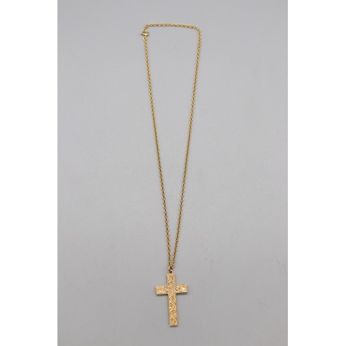 54 - Stamped 9ct yellow gold cross pendant with hand engraved scrollwork on a stamped 9ct yellow gold bel... 