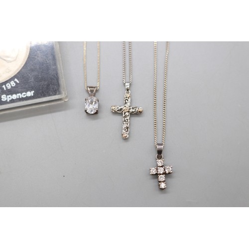 57 - Lot of silver items, comprising a stamped sterling silver scrollwork hollow egg earrings and pendant... 