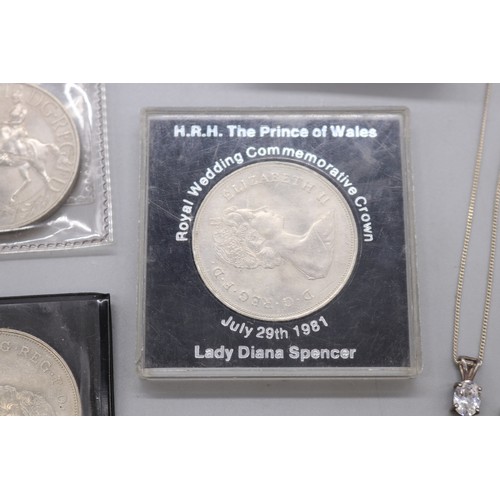 57 - Lot of silver items, comprising a stamped sterling silver scrollwork hollow egg earrings and pendant... 