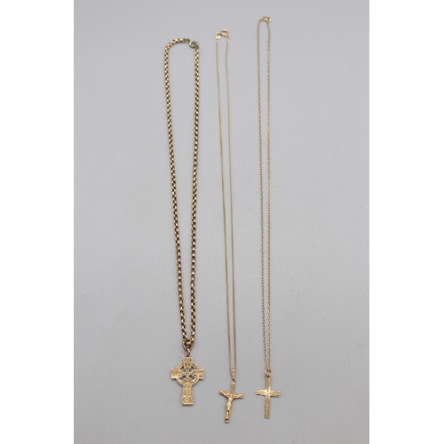 58 - Lot of three gold crosses, comprising a 9ct yellow gold Celtic cross pendant with hand-engraved fron... 