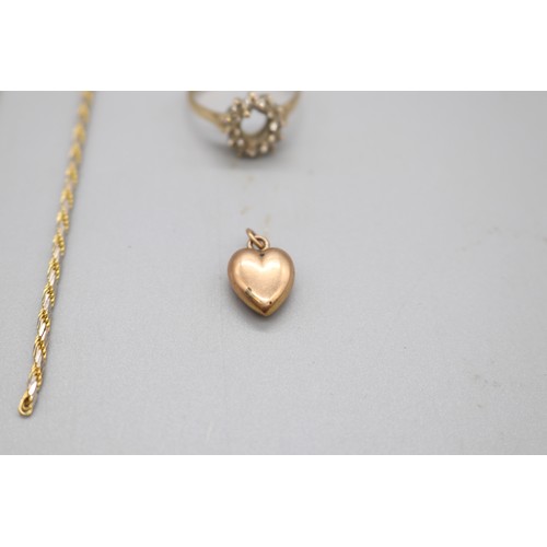 60 - Lot of hallmarked 9ct yellow gold items, comprising an oval dark sapphire halo set ring with CZ whit... 