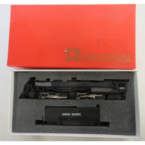 21 - Seven boxed N gauge American steam locomotive models from Rivarossi, Lima, and Atlas, most models ex... 