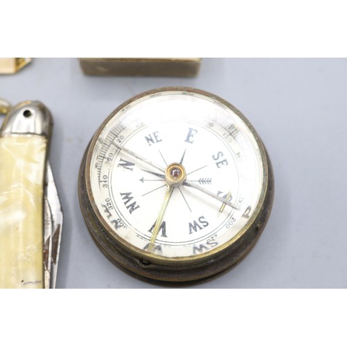 51 - Two 9ct gold signet rings, shanks stamped .375, gross weight 6.1g; brass military type compass with ... 