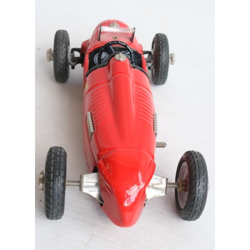 Two modern reissued clockwork racing car models from Schuco to include ...