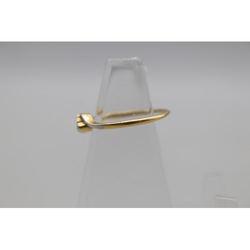 7 - Stamped 18ct yellow gold and platinum trilogy ring, set with three small bezel-set diamonds, size Q,... 