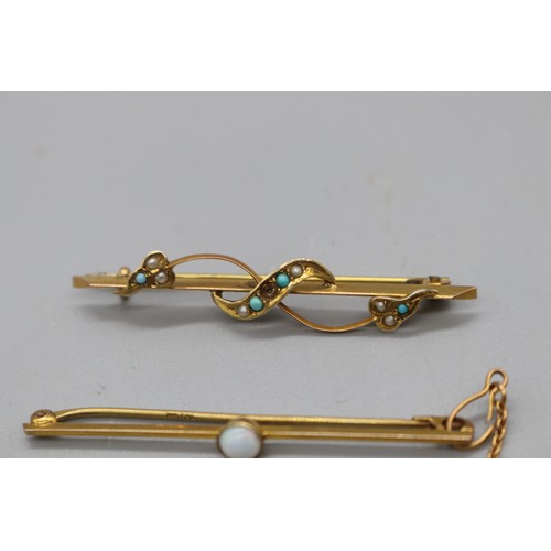 20 - Two gold bar brooches, comprising a stamped 9ct yellow gold bar brooch with a millgrain bezel-set op... 