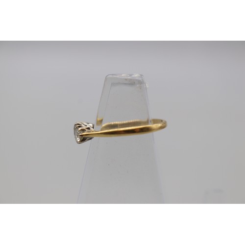 6 - Stamped 18ct yellow gold diamond trilogy ring, set with an approximately 0.30ct round brilliant cut ... 