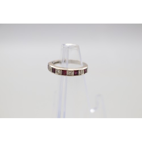 4 - Hallmarked 18ct white gold ruby and diamond eternity ring, set with princess cut rubies and round br... 
