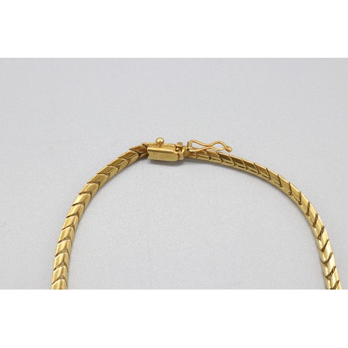 1 - Stamped 750 yellow gold herringbone link necklet, length 18