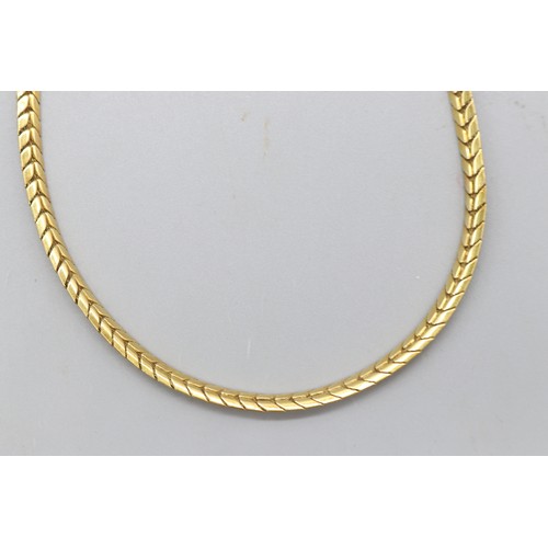 1 - Stamped 750 yellow gold herringbone link necklet, length 18