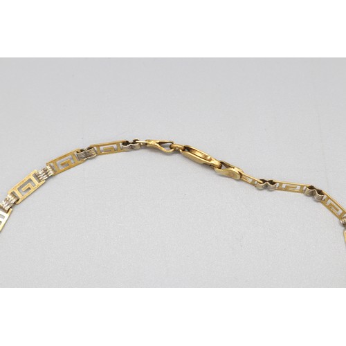 16 - Hallmarked 18ct yellow and white gold two-tone Greek key necklace and bracelet set, comprising a nec... 